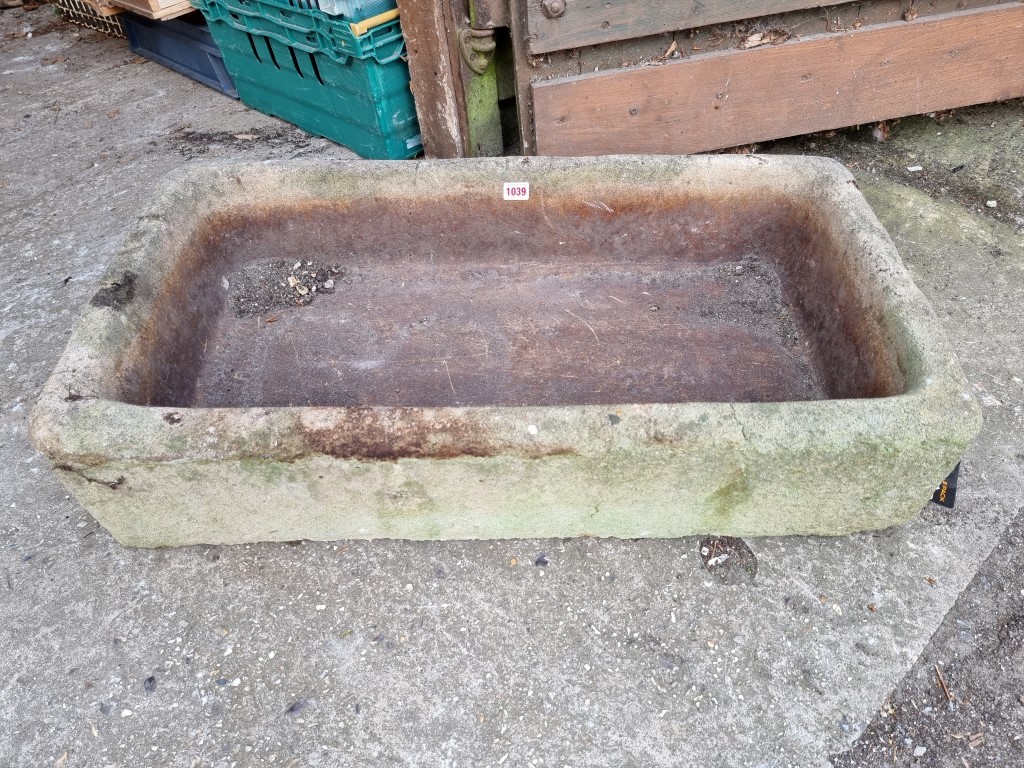 An old stone basin, 82cm wide.