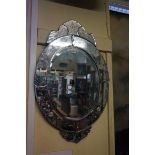 An antique Venetian wall mirror, 76 x 49cm.