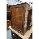 A 19th century mahogany collector's cabinet, the panelled door enclosing thirteen long drawers, each