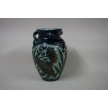 An early 20th century Barum pottery fish vase, by Alexander Lauder, 18cm high.