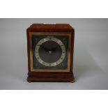 A 1920s mahogany mantel timepiece, possibly Elliott, 15.5cm high.