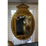 An interesting Aesthetic giltwood framed wall mirror, painted with a butterfly and foliage, 73 x