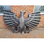 A massive 1950s black fibre glass eagle, 103cm high x 228cm wide. By repute from the Eagle Tanker