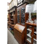 An Edwardian mahogany and inlaid bureau bookcase, 96.5cm wide.