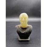 An unusual 19th century carved celadon jade and bronze classical bust, 5.5cm high.