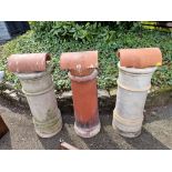 Three old chimney pots.