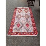 A Turkish silk Soumak rug, central field decorated with animals, with stars to border, 198cm x