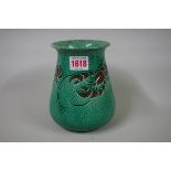 A Brannam for Liberty & Co green glazed vase, decorated with lobsters, 15.5cm high.