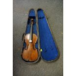 An antique Continental violin, with 14in two-piece back, in ebonized case.