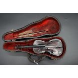 An antique novelty miniature cello, total length 23.5cm, with corresponding bow and case,