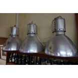 A set of three large aluminium industrial ceiling lights, 57cm high x 48.5cm diameter.