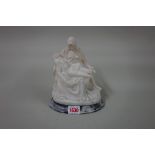 After Michelangelo, a carved white marble Pieta figure group, on grey marble base, 19.5cm high, (