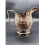 A Georgian style silver milk jug, by George Nathan & Ridley Hayes, Chester 1906, 10cm high, 140g.