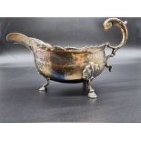 A George III silver sauce boat, by Charles Hougham, London 1784, 283g.