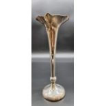 A large Edwardian silver trumpet vase, by William Neale, Birmingham 1907, 30cm high, weighted.