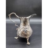 A George II silver milk jug, maker possibly G C, London 1753, 9.5cm high, 85g.