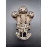 Of Royal interest: an unusual Victorian silver 'Prince of Wales' feather mount, with the motto '