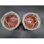 A pair of silver bottle coasters, by Carr's of Sheffield Ltd, 2001, 19.5cm diameter.