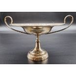 A small silver twin handled tazza, by Carrington & Co, London 1909, 12cm diameter excluding handles,