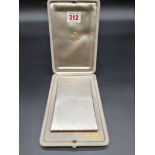 A cased Van Cleef & Arpels gold mounted engine turned silver cigarette case, with French control