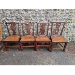 Three Georgian oak chairs; together with one other. (4)