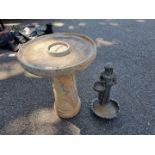 A reconstituted pedestal bird bath; together with a smaller figural bird bath.