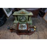 An onyx mantel clock; together with a Dutch wall clock.