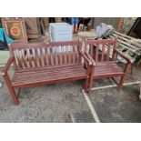 A wooden garden bench, 122cm wide; together with a matching armchair, 62cm wide.