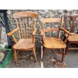 A pine stickback kitchen chair; together with another similar.