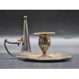 A George III silver chamberstick and snuffer, by Thomas Robins, London 1812, having gadrooned, shell