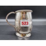 An Arts & Crafts silver Christening mug, by Amy Sandheim, London 1925, 9cm high, 206g.