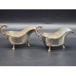 A pair of silver sauce boats, by Josiah Williams & Co, London 1919, 18.5cm long, 236g.