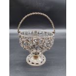 A George III silver wire work swing handled basket, by William Vincent, London 1773, 10.5cm high,