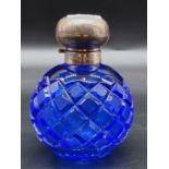 A silver topped blue cut glass globular scent bottle, by The Original Perfume Bottle Co Ltd,