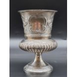 A William IV silver goblet, having repousse chased decoration, by J E Terrey & Co, London 1832, 16.