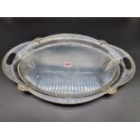 A silver twin handled oval tray, Sheffield 1932, having reeded border, 50cm long, 1652g