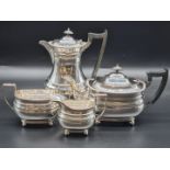 A silver four piece tea set, by W Hutton & Sons Ltd, Sheffield 1936, the hot water jug 23.5cm