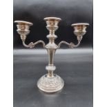 A silver twin branch candelabrum, by W I Broadway & Co, Birmingham 1979, 23.5cm high, weighted.