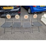 A set of four folding garden chairs, having mosaic backs.