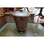 An Art Nouveau brass and wrought iron coal bucket and cover, 40cm high.