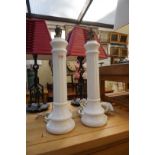 A pair of white onyx table lamps, height including fitting 46cm.