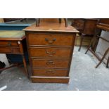 A reproduction burr walnut and leather top filing cabinet, 55cm wide.