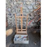 A Daler Rowney folding artist's easel; together with a small quantity of paints.