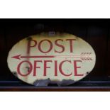 An enamel 'Post Office' double sided oval sign, 45.5cm wide.