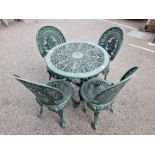 A green painted aluminium garden table, 69cm wide x 69cm high; together with four matching chairs.