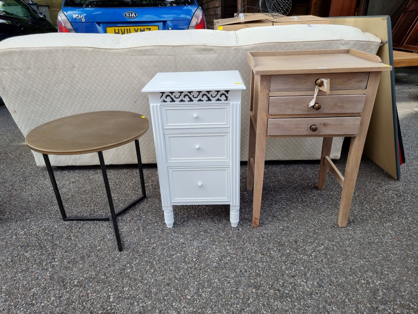 A modern three drawer side table, 49cm wide x 75cm high; together with a bedside chest, 40cm wide