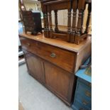 An unusual 19th century mahogany secretaire press cupboard, with a pair of panelled cupboards