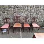 An antique salon armchair; together with three matching salon chairs; and an Edwardian low chair. (