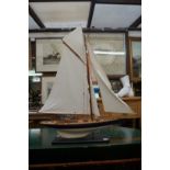 A model yacht, the hull 60cm, on fixed stand.