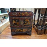A small Japanese lacquer and gilt table cabinet, 36.5 x 30.5cm.